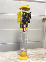 Full view of feeder standing upright on table