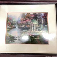 Full view of framed and matted print under glass