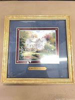 Front view of framed Thomas Kinkade print