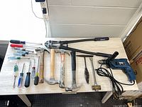 Entire lot laid out on table showing all tools