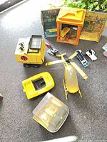 Overall lot showing HQ, helicopter, vehicles, small sled craft