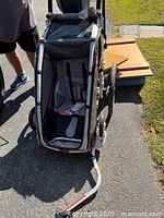 Front view interior showing single seat harness and tow arm