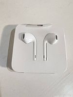 Front view of EarPods in packaging