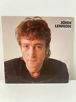 Front cover showing John Lennon portrait