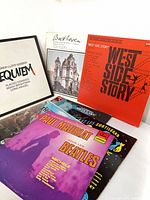 Group shot of five vinyl LP covers including Requiem, West Side Story, Beatles orchestral, Beethoven, and Les Sortileges