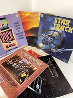 Front covers of seven vinyl LPs including MTV’s Rock ’N Roll, Star Track, The American Dream, Supertramp and others