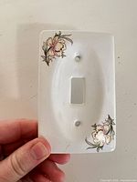 Front view showing floral design and overall condition