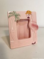 Front view showing flamingo, palm tree and full design