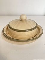 Covered dish assembled showing overall design