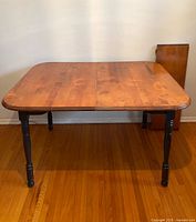 Full view of table closed, leaf standing at side