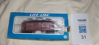 Caboose inside original Life-Like window box with MaxSold lot card