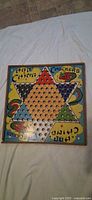 Front view colourful Chinese checkers board