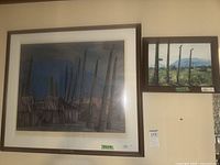 Both framed artworks on wall for scale and framing detail