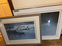 Both framed Bateman prints side by side