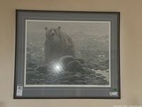 Full view of framed lithograph on wall