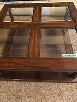 Top view showing four glass panels in wood frame and size label