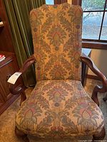 full view of upholstered high-back armchair
