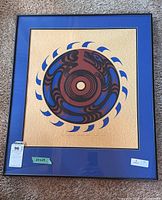 Full view of framed serigraph showing design, mat and frame