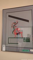 Full view of framed serigraph with artist signature visible