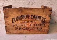 Front view showing "Dominion Canners Limited Pure Food Products" graphics