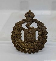 Front view of WW2 Royal Strathcona's Horse cap badge showing design details