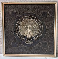 Full view of framed square embroidery showing complete design and frame