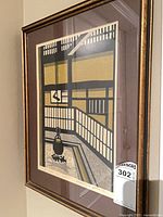 Overall view of framed print showing artwork, mat, and frame