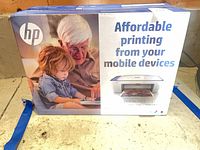 Front of box showing HP DeskJet 2655 and features