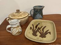 Group shot showing all four pottery pieces