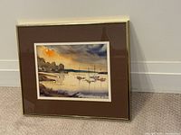 Framed painting front view showing entire piece with mat and frame