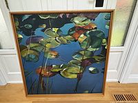 Full view of framed square waterlily painting