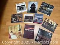 Group shot of all ten Canadian art books laid out on floor