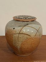 Frontal view of vase with lid in place