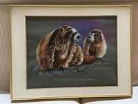 Full view of framed pastel showing two marmots, mat and frame