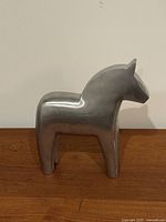 Left side view of cast aluminum Dala horse