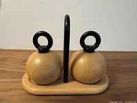 Front view of both beechwood mills seated in stand