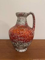 Front view showing handle and glaze pattern