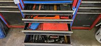 overview of four open drawers showing tool variety