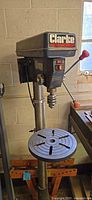 Full view of Clarke drill press showing head, column and table