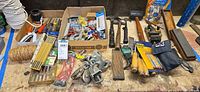 Workbench view showing entire lot with tools, hardware, rope and chisels