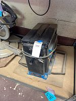 Top and side view of planer showing overall form and power cord