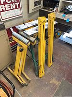 Workbench, two roller stands, three folded sawhorses