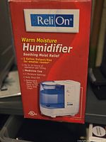 ReliOn humidifier retail box front showing model and features