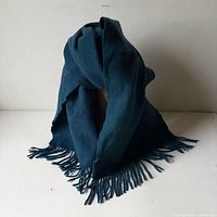 Scarf draped to show overall look and fringe