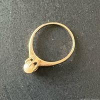 Ring top view showing pearl setting