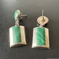 Front view showing malachite inlay and sterling setting