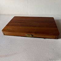 closed walnut box showing top and latch