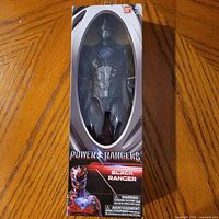 Front view of boxed Black Ranger figure