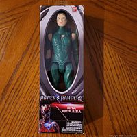 Front of sealed Rita Repulsa figure box