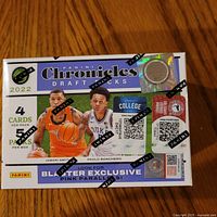 Front angled view showing sealed 2022 Panini Chronicles Draft Picks Basketball blaster box with player images and hologram